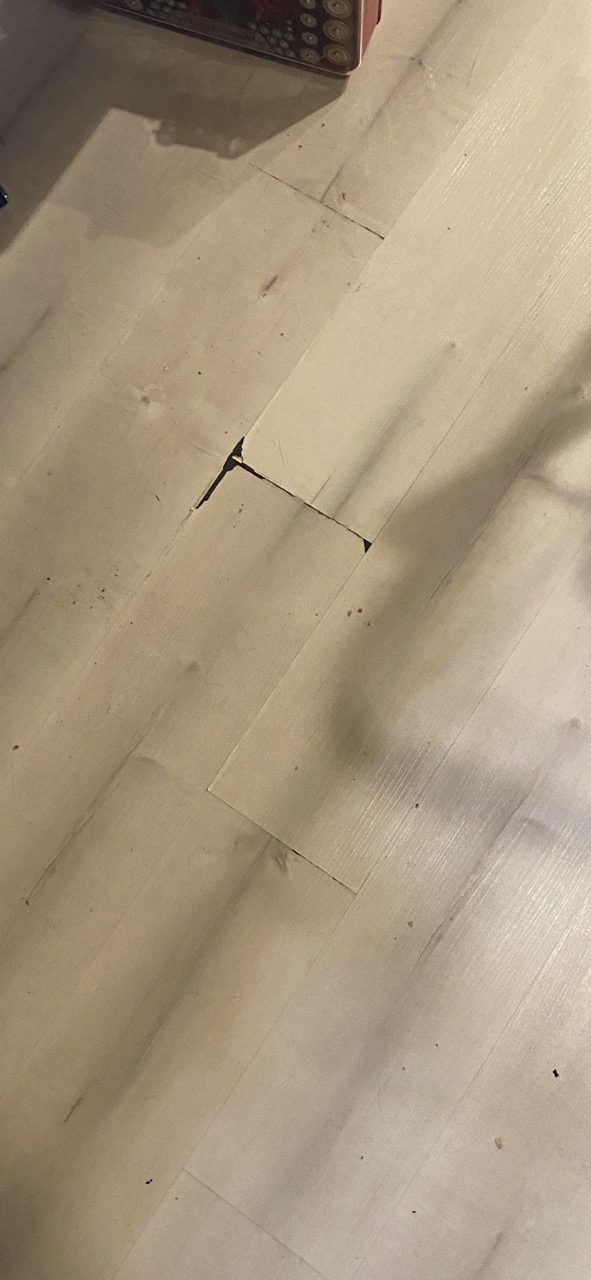 LVP flooring before repair